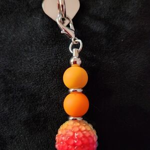 Vibrant Orange and Red Beaded Tumbler Charm
